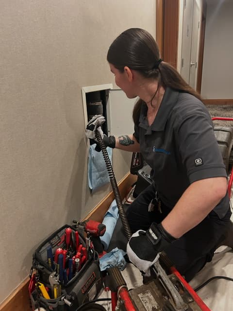 A Pacific West Mechanical technician at work